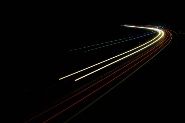istock lights of cars with night 1162714253