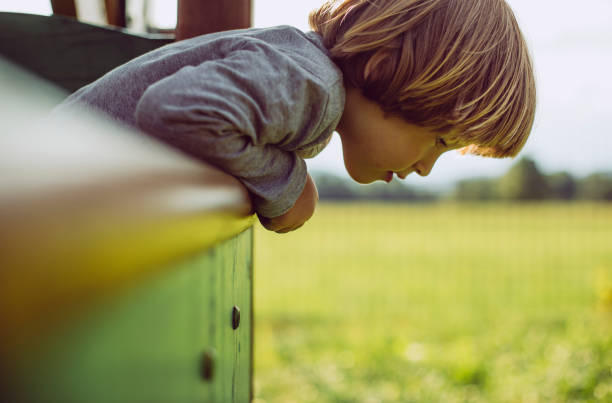 istock Toddler playing in public park 1162715374
