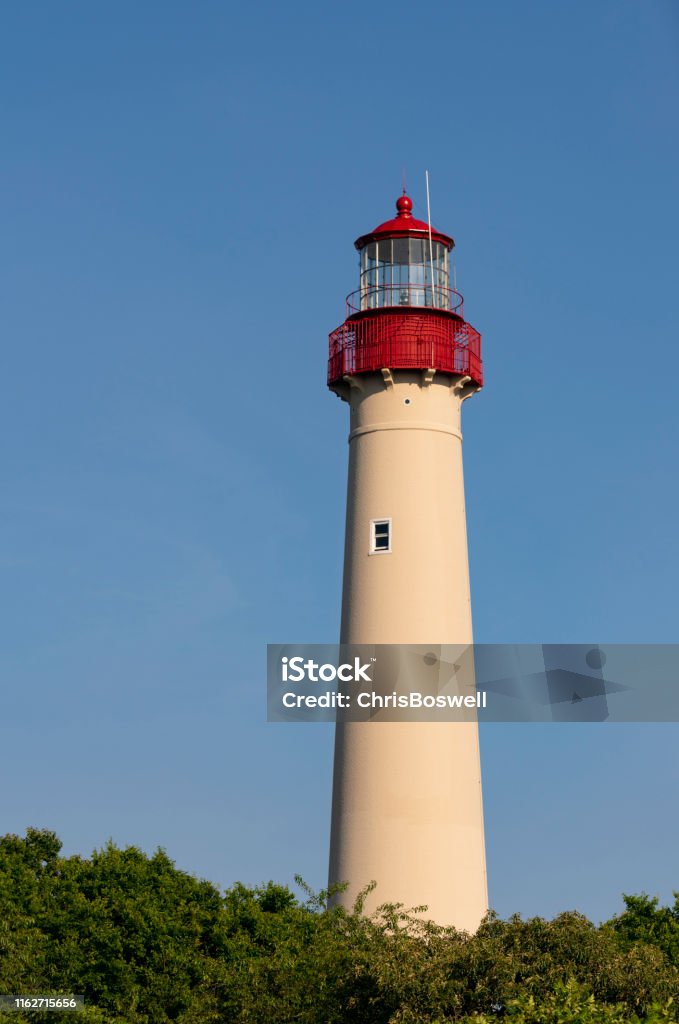 Atlantic Ocean Coastal Beacon Cape May Lighthouse in New Jersey USA Bright red cap paint and updated fresnel lens keep the Cape May Lighhouse fresh and working Cape May - New Jersey Stock Photo