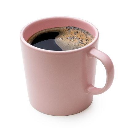 Black coffee in a pink ceramic mug isolated on white.