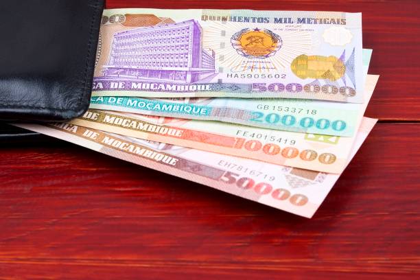 istock Old Mozambican money in the black wallet 1162716667