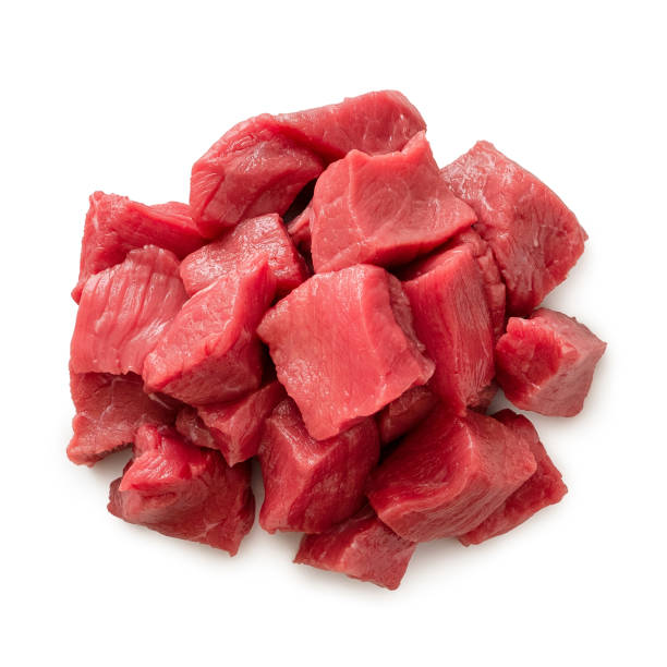 istock Pile of beef cubes isolated on white from above. 1162717444