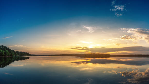 istock Panoramic shot of beautiful sunrise over lake. Extra high resolution image. 1162721997