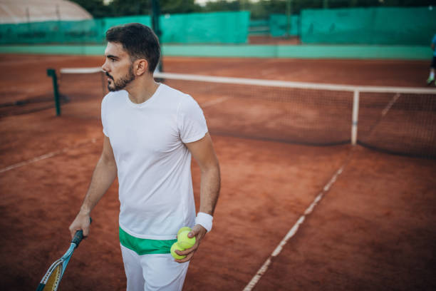 istock Tennis player on clay court 1162725132