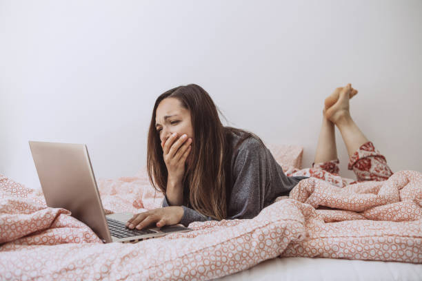 istock The girl uses a laptop 1162725238