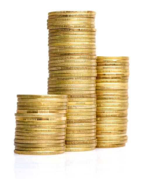 istock old & used golden coins stack up in white background 1162730552