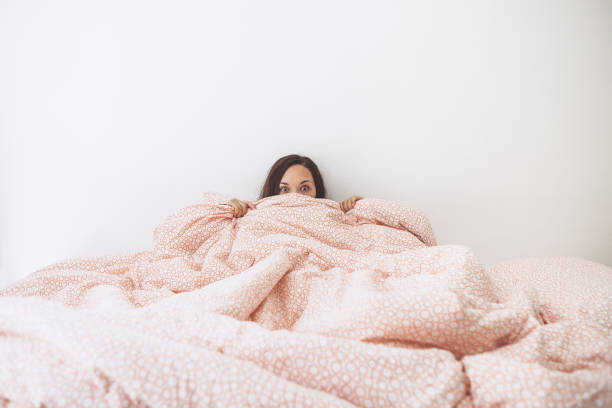 istock The girl covers her face 1162731658