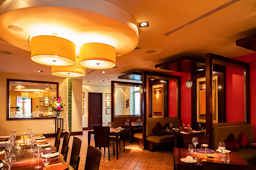 Dubai, Luxury, Fine Dining - Elegantly decorated interior of a fine dining Indian restaurant