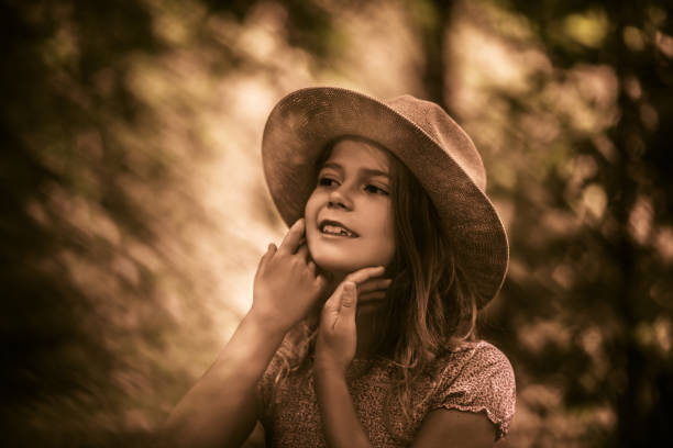 The feeling is wonderful when you are in nature. Little girl outdoor.