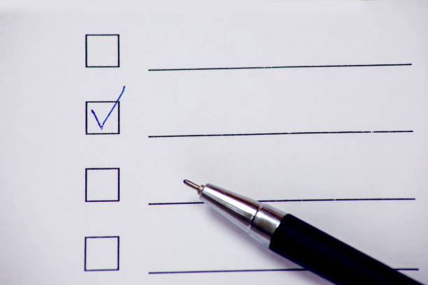 istock Checklist box with pen on white paper. Check form concept 1162734888