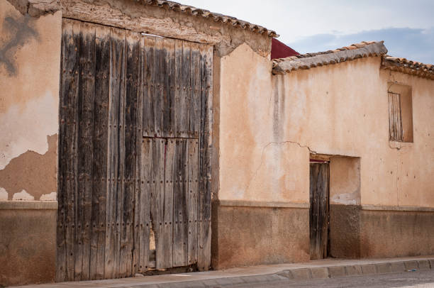 istock Ancient wooden door in old house 1162735090