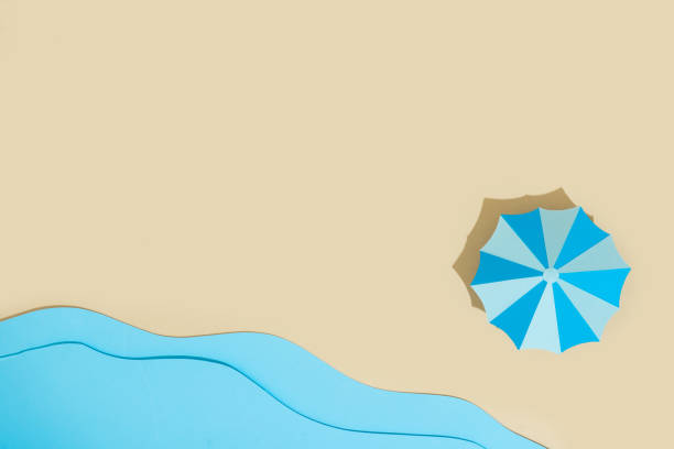 istock Paper beach with umbrella and sea. Vacation minimal concept. 1162737265