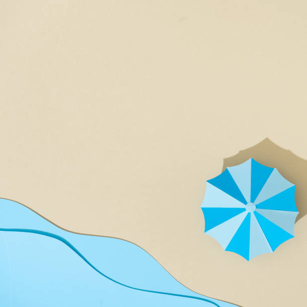 istock Paper beach with umbrella and sea. Vacation minimal concept. 1162737623