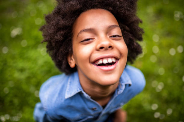 istock Smiling girl at the park. 1162745257