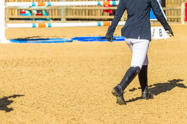 Photo of Equestrian Rider Headless Walking Arena Outdoors