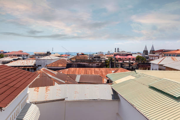 istock zanzibar stone town rooftop view looking over the rustic colorful corrugated iron roof sheeting 1162748779