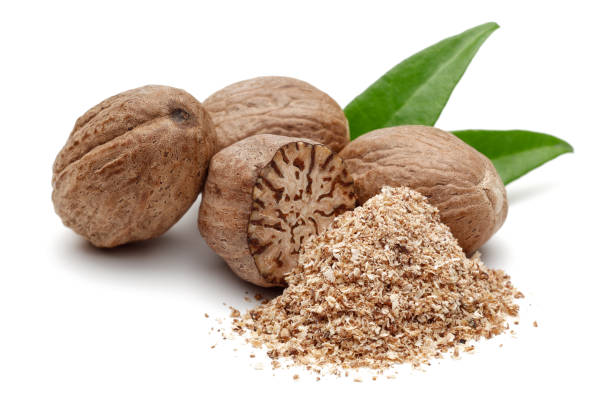 istock Whole and grated nutmeg with leaves isolated 1162752338