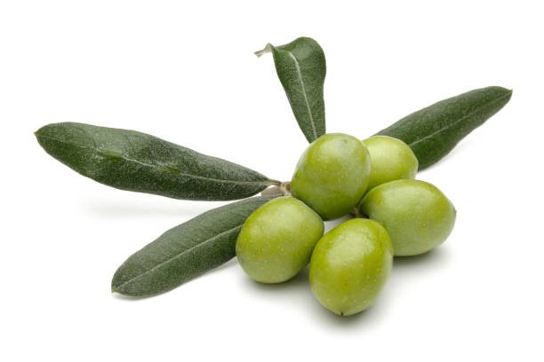 istock Green olives with leaves isolated on white 1162752951