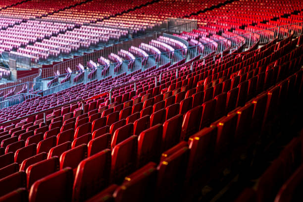 Vacant red chairs of stadium stand