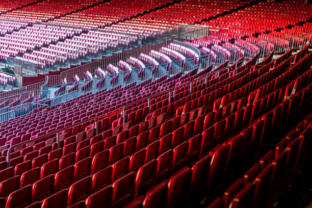 istock Vacant red chairs of stadium stand 1162753546