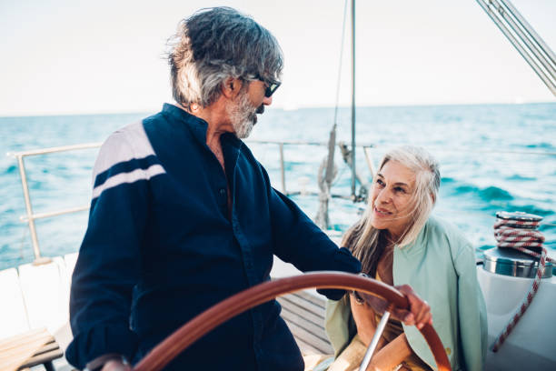 istock Senior man sailing on a yacht 1162753939