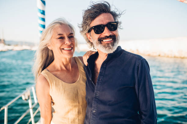 istock Old couple hugging on a yacht 1162753984