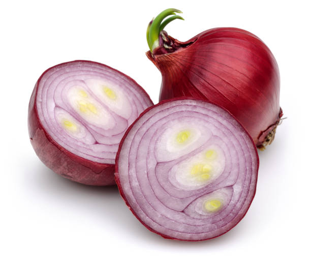 istock Red onion with slices isolated on white 1162754175