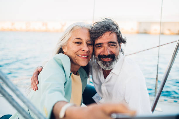 istock Old couple hugging on a sail 1162754415