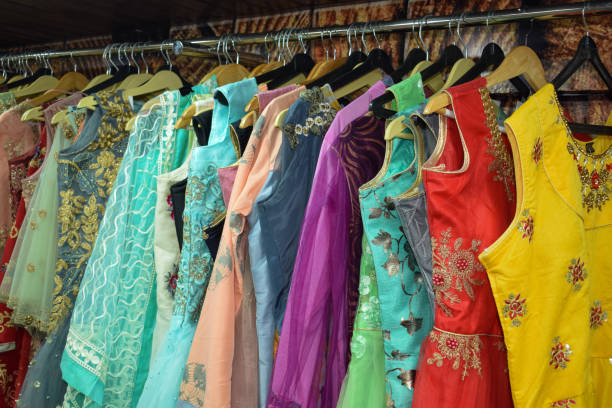 istock Colourful designer gowns frocks skirts clothes kurtis 1162755708