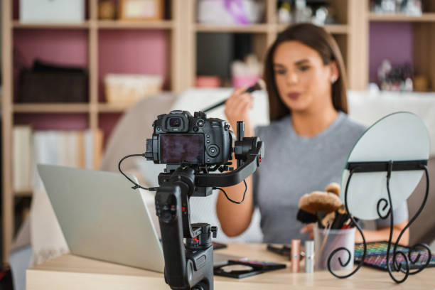 istock Professional camera filming a video podcast 1162756156