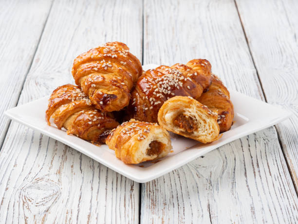 istock Croissants on a white plate. 1162756434