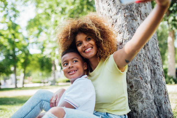 istock Mother and son at park 1162757357