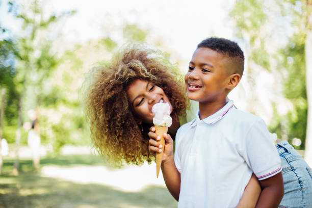 istock Mother and son licking ice cream 1162762437