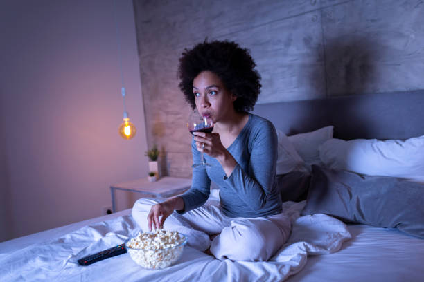 istock Woman watching television 1162765822
