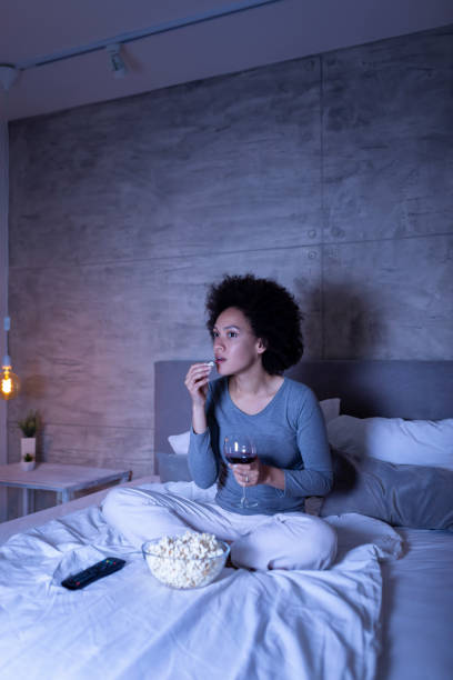 istock Woman watching TV 1162765872
