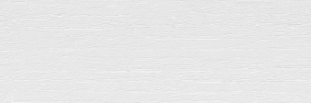 istock Plastering brick wall painted by paper white color can be use as wall paper or texture background of white color for also new year card or winter season. 1162770221