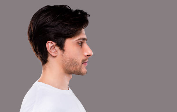 istock Profile portrait of young handsome caucasian man 1162771601