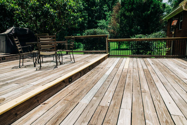 istock large worn wooden deck needing renovation and staining 1162771844