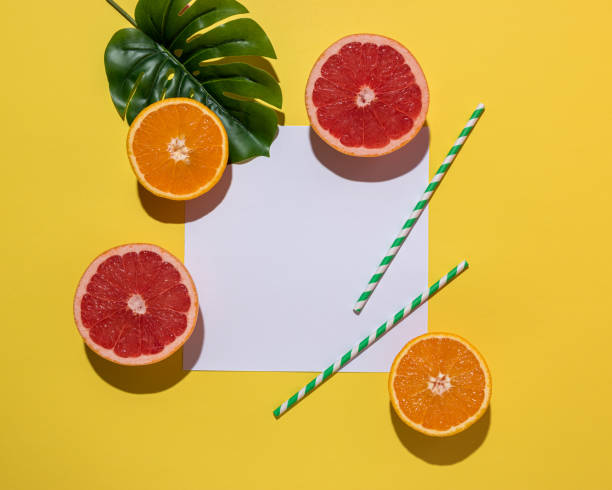 istock Creative fruit composition on yellow background with hard shadows. Summer minimal concept. 1162772125
