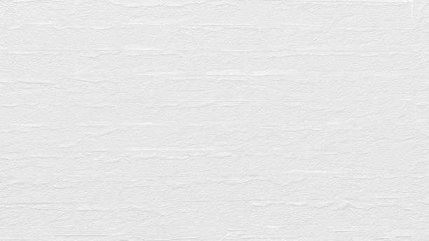 istock Plastering brick wall painted by paper white color can be use as wall paper or texture background of white color for also new year card or winter season. 1162776063