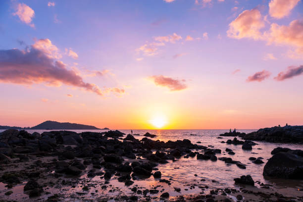 istock Long exposure image of Dramatic sky seascape with rock in sunset scenery background 1162777847