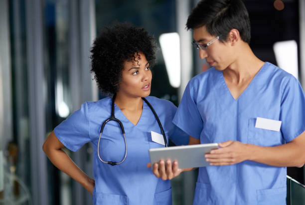 istock Assessing the latest information about their patients 1162781848