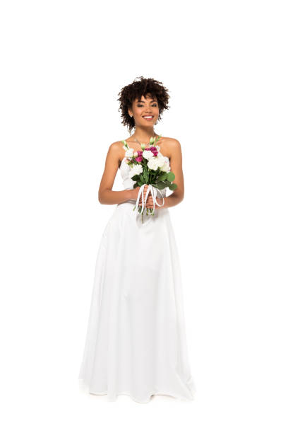 istock happy african american bride holding bouquet isolated on white 1162786947