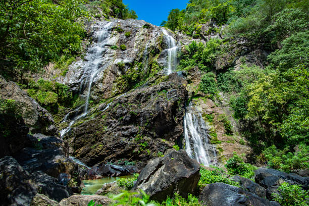 istock Beautiful waterfall in the green forest. Great waterfall in Thailand 1162787692