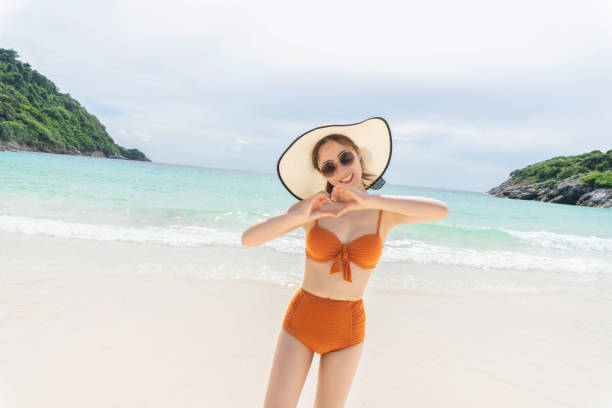 istock Woman at sea beach 1162788352