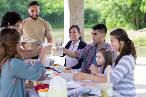 istock Cheerful family sharing celebratory toast 1162792903