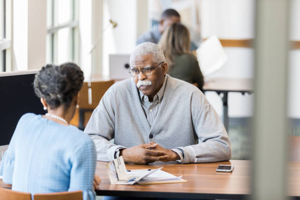istock Unrecognizable financial advisor helps senior man plan retirement 1162793144