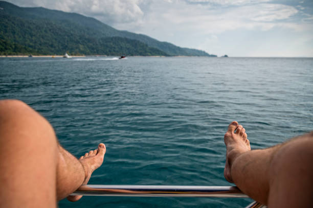 istock Personal perspective of man sitting on a boat 1162801995