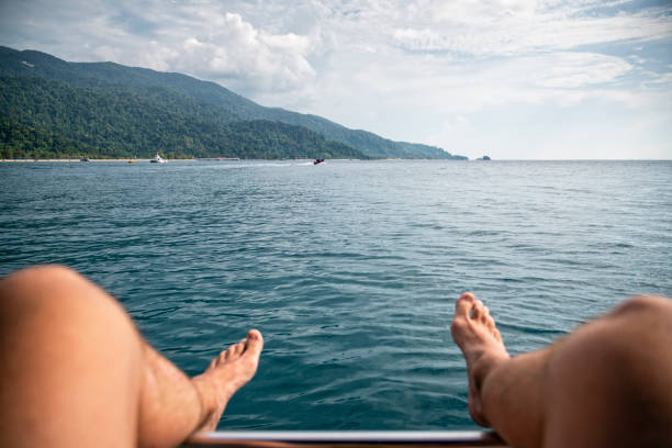 istock Personal perspective of man sitting on a boat 1162802145