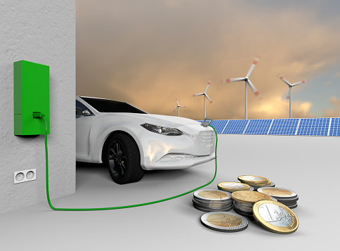 An electric car charges its batteries. Euro coins are in the foreground. Solar panels and wind turbines are in the background. Brandless car. No real prototype.